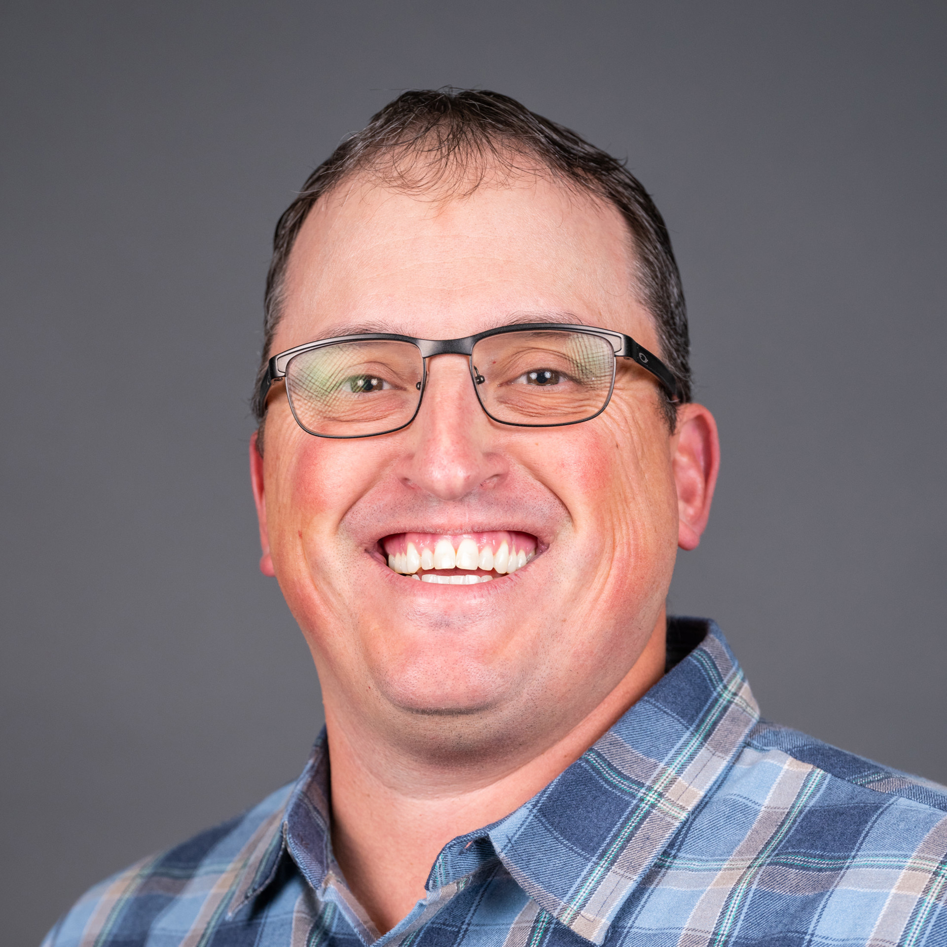 Headshot of Justin Stewart